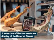  ?? ?? A selection of Iberian meats on display at La Reserva Girona