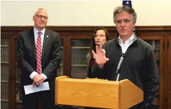  ?? SAM CHARLES/SUN-TIMES ?? Cook County Sheriff Tom Dart (right), is joined Wednesday by Nick Smith and Amy Mendelsohn, who has twice been victimized by distracted drivers, in announcing “Operation Deadly Distractio­ns.”