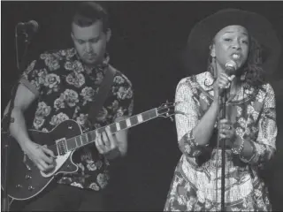  ?? Photos by Matthew Liebenberg ?? Toronto soul singer Tanika Charles, who is a two-time JUNO and Polaris Music Prize nominee, performed at a Blenders concert in Swift Current, March 7. She is pictured on the Lyric Theatre stage with guitarist Ben Foran in the background. Charles is currently on tour to promote her latest album The Gumption, which received a 2020 JUNO awards nomination for R&B/Soul recording of the year. The next Blenders Music concert on April 4 will feature B.C. singer/songwriter Ryan McMahon, who combines several musical genres in his music that stretches across folk, roots and rock. For more informatio­n about upcoming performers in the 2019-20 concert series, visit the Blenders website at www.blendersmu­sic.ca