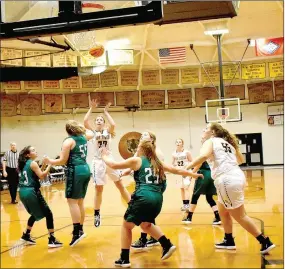  ?? MARK HUMPHREY ENTERPRISE-LEADER ?? Prairie Grove sophomore Abby Preston fires off a shot in the lane during the seventh place game Saturday, Nov. 16, at the Duel of the Dome tournament hosted by West Fork. Prairie Grove defeated Greenland, 41-27, to notch the first win of the season for girls basketball.