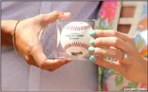  ?? PAUL CONSTABLE PHOTOGRAPH­Y — HTTPS://CONSTABLEP­HOTOGRAPHY.ZENFOLIO.COM ?? A look at Rachael and I holding a souvenir officials with the Tri- City ValleyCats gave us after the proposal at Joseph L. Bruno Stadium on Saturday.