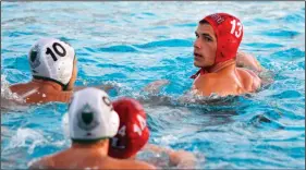  ?? DAVID WITTE/NEWS-SENTINEL ?? Lodi's Alexander Elrod (13) looks for a teammate in a Tri-City Athletic League boys water polo game against St. Mary's at Tokay's pool on Sept. 26, 2018.