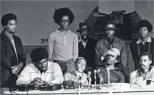  ?? ?? “Dear Mama” focuses on Tupac’s relationsh­ip with his activist mother, Afeni Shakur, seated center, above.