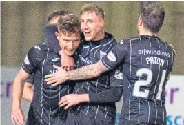  ??  ?? Euan Murray, left, celebrates after giving the Pars the lead.