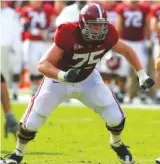  ?? UNIVERSITY OF ALABAMA PHOTO ?? Alabama’s Barrett Jones became the first football player in SEC history to earn all-league honors at three positions, performing the feat at right guard in 2010, left tackle in 2011 and center in 2012.