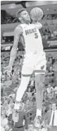  ?? JOHN MCCALL/SUN SENTINEL ?? Heat forward Derrick Jones Jr. throws down a slam dunk Monday night.