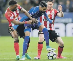  ??  ?? Jermain Defoe and Bryan Oviedo battle against Riyad Mahrez