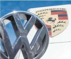  ?? FOTO: BERND WEISSBROD/DPA ?? Die Marke Porsche gehört zum Volkswagen-Konzern.