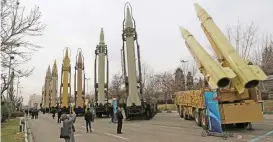  ?? (AFP) ?? This file photo shows Iranians visiting a weaponry and military equipment exhibition organised on the occasion of the 40th anniversar­y of the Iranian revolution, in the capital Tehran on February 2, 2019