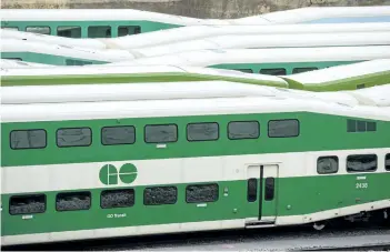  ?? ERNEST DOROSZUK/ POSTMEDIA NEWS ?? GO Trains in downtown, west of Spadina in Toronto, in January 2017.