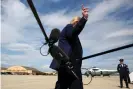  ?? Photograph: Jonathan Ernst/Reuters ?? Trump boards Air Force One after speaking with reporters on Thursday.