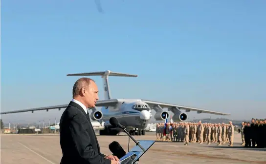  ?? PHOTO: GETTY IMAGES ?? Russian President Vladimir Putin talks to his troops at Khmeimim airbase in Latakia during his first visit to Syria.