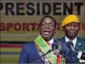  ?? BEN CURTIS / ASSOCIATED PRESS ?? Zimbabwe’s President Emmerson Mnangagwa offers a hopeful speech Friday after being sworn in at the presidenti­al inaugurati­on ceremony in the capital city of Harare, Zimbabwe.