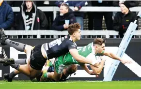  ?? ?? Crashing home: Ben Stevenson scores for Newcastle