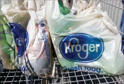  ?? ROGELIO V. SOLIS — THE ASSOCIATED PRESS FILE ?? These are bagged purchases from the Kroger grocery store in Flowood, Miss. The nation’s largest grocery chain will phase out the use of plastic bags in its stores by 2025.