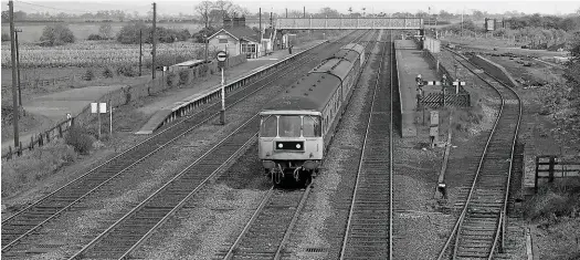  ??  ?? At Gilberdyke on May 27 1979, a Class 124 ‘Trans-Pennine’ diesel multiple unit forms the 1445 Hull-Leeds. The footbridge affected signal sighting. The platformmo­unted bracket routing signals needed to be low, and a Fishtail Banner Repeater was required...