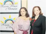  ??  ?? Ana Maria Guevara, honoree, left, and Elena Brouwer attend the charity event.