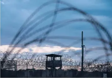  ?? DOUG MILLS/THE NEW YORK TIMES 2019 ?? Camp X-Ray, which is no longer in use, was the original detention camp for prisoners at Guantanamo Bay after the Sept. 11 attacks. Almost 20 years later, about 40 detainees remain at the prison in Cuba.