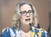  ?? MANDEL NGAN — POOL VIA AP ?? Sen. Kyrsten Sinema, D-Ariz., speakingin­g during a Senate Finance Committee hearing on Oct. 19 in Washington, D.C., is now comfortabl­e with accepting corporate donations.