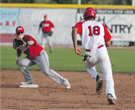  ?? ARYN TOOMBS/ CALGARY HERALD ?? Okotoks baserunner Kellen Marruffo is out on the force play at second as the Dawgs battled the Medicine Hat Mavericks in Game 5 of of their Western Major League Baseball opening round series. The Dawgs dropped a 7- 3 count and were eliminated.