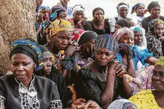  ?? Audu Ai Marte / AFP/Getty Images ?? Parents and relatives of Chibok girls abducted by Boko Haram jihadists “are losing hope” that the 112 girls who are still missing will be rescued, said Allen Manasa, a spokesman for the village.