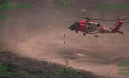  ?? ?? Coast guard crews arrive to rescue the men off the coast of south-east Louisiana. Photograph: Courtesy of the US coast guard