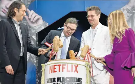  ?? Franck Robichon European Pressphoto Agency ?? DIRECTOR David Michôd, left, with producer Jeremy Kleiner, Brad Pitt and producer Dede Gardner at “War” premiere in Japan.