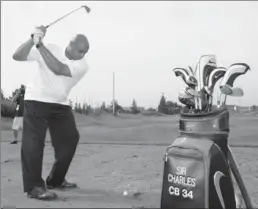  ?? TONY BOCK, TORONTO STAR ?? Charles Barkley working hard on “theworld’s ugliest golf swing.”