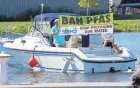  ?? MARK HOFFMAN/MILWAUKEE JOURNAL SENTINEL ?? Clean water activists deliver their message offshore as Environmen­tal Protection Agency Administra­tor Andrew R. Wheeler speaks Aug. 11 in Marinette. The protesters highlighte­d the long-lasting impact of PFAS — known as “forever chemicals” — on the environmen­t.