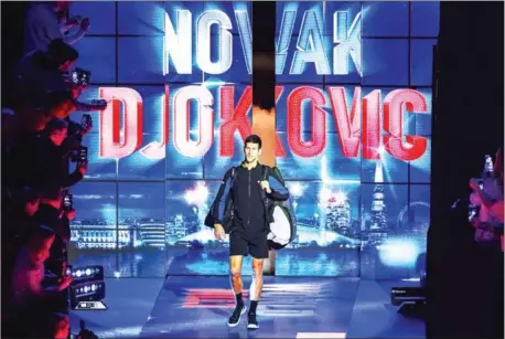  ?? AFP ?? Novak Djokovic beat Alexander Zverev to reach the semi-finals of the prestigiou­s ATP Finals at London’s O2 Arena on Wednesday.