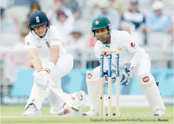  ?? –Reuters ?? England’s Joe Root scores his third four in a row.