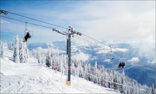  ?? — THE ASSOCIATED PRESS FILES ?? Red Mountain in Rossland is one of eight ski resorts along a circuit called the Powder Highway in the Kootenays, located on the western slope of the Rockies and in the Purcell and Selkirk mountain ranges.