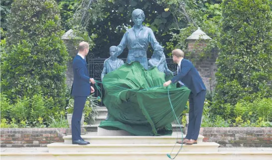  ?? Photo / AP ?? Prince William and Prince Harry unveil they statue they commission­ed of their mother, Diana, Princess of Wales, in the Sunken Garden at Kensington Palace in London.