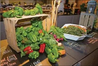  ?? CONTRIBUTE­D PHOTOS BY PHIL SKINNER ?? Vegetables spill out of a display alongside prepared dishes from local farms at the Food Well Alliance’s annual Love Local event at the King Plow Arts Center on Oct. 5. Food Well Alliance brought together policymake­rs, funders, innovators and urban...