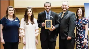  ??  ?? Patterson Federal Credit Union received the Excellence in Small Business Award from the Arkadelphi­a Alliance and Area Chamber of Commerce. Accepting the award at the banquet are, from left, Kyla Batson, Lauren Taylor, Shawn Cowart, Clay Phillips and...