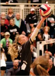  ?? Jeremy Stewart / Rome News-Tribune ?? Coosa’s Kasey Thacker attacks the ball at the net during the third set of Saturday’s match in Atlanta