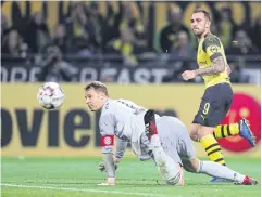  ?? EPA ?? Dortmund’s Paco Alcacer scores his team’s third goal against Bayern Munich.