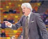  ?? ELI LUCERO/THE HERALD JOURNAL VIA AP ?? UNM coach Craig Neal argues a call during Wednesday night’s loss to Utah State. The Lobos fell 79-75.