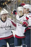  ??  ?? Washington Capitals centre Nicklas Backstrom, right, celebrates a goal against the Pittsburgh Penguins in Game 6 on Monday night in Pittsburgh.