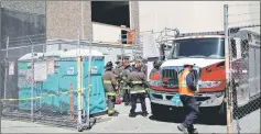  ??  ?? Firefighte­rs and Pacific Gas and Electric (PG&E) workers gather outside substation after a fire broke out in San Francisco, California, US. — Reuters photo