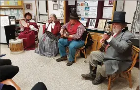  ?? Courtesy Photo ?? One of the many popular programs presented at the Bella Vista Civil War Round Table’s meetings in 2021 was by the Tulsa-based musical group Loco Focos. The group performed and interprete­d music that was popular during the Civil War Era. The group spokesman explained how they came up with their name by telling the story of loco focos matches, popular in the early to mid 1880’s, and why the matches ended up having a political party named after them. The program began and ended with songs by Stephen Foster, the American song writer known in the mid 1800’s for his parlor and minstrel music.