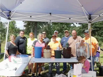  ??  ?? above Members of Redwater Volunteer Fire Department arrive to help make homemade ice cream for the old-fashioned ice cream social Saturday afternoon. From left are Lorie Hewett, Hayden Moore, Jessica Johnston, Gina Lansdell, Brian Durbin, Kayla Hewett,...