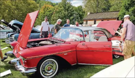  ?? PHOTOS BY HAYLIE SCHLATER ?? Cadillac was one of the featured marques; this 1957 Cadillac Eldorado belonging to Robert Werner of Dayton won the People’s Choice Award. It features a stainless-steel roof.