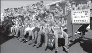  ?? Photo by Susan Holland ?? The Gravette Junior High football team rode on a float in the 2017 Gravette homecoming parade.