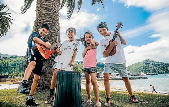  ?? PHOTO: DAVID JAMES/FAIRFAX NZ ?? Picton children, from left, Mana Collins, Aki Collins, Mari Jameson and Corban Jameson are looking forward to taking part in a free three-day music programme for Marlboroug­h kids.