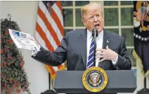  ?? Evan Vucci The Associated Press ?? President Donald Trump holds a news conference Wednesday in the Rose Garden of the White House.