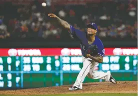  ?? The Associated Press ?? ■ Texas Rangers relief pitcher Matt Bush delivers against the Kansas City Royals during the seventh inning of a May 24, 2018, game in Arlington, Texas. Veteran pitchers Bush and Ian Kennedy will break from the Texas Rangers spring training camp as top options in the back end of the bullpen. Bush has had surgery twice on his right elbow since his last big league appearance in 2018.