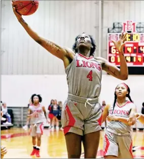  ?? ?? Kyunna Thomas goes up to score a basket for the Lady Lions. (Photo by Jason Clark, SDN file)