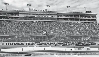  ?? TERRY RENNA/AP ?? Cars get the green flag at the start of last year’s NASCAR Cup Series championsh­ip race, at Homestead-Miami Speedway. NASCAR has moved “championsh­ip weekend” to Phoenix in 2020.