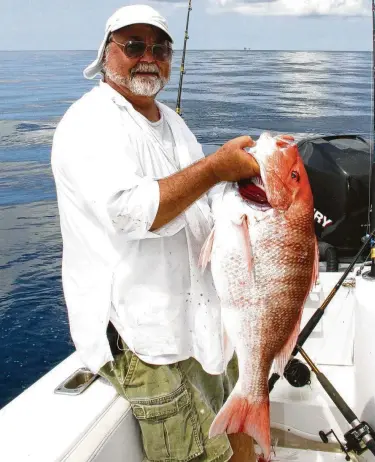  ?? Shannon Tompkins / Staff ?? Anglers landing red snapper this year have an opportunit­y to aid science and their wallets if they catch one of 4,000 snapper fit with tags worth as much as $500. The tags are part of a Gulfwide research project focused on estimating the population of the popular and economical­ly important reef fish.